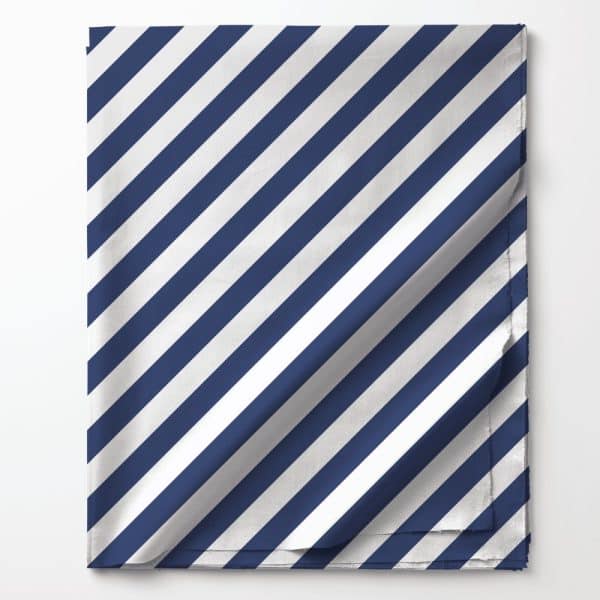 Folded Fabric With Diagonal Navy Blue And White Stripes.