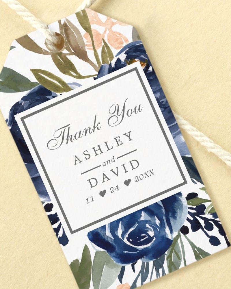 Wedding thank you gift tag with navy blue floral design and Ashley and David's names and wedding date.