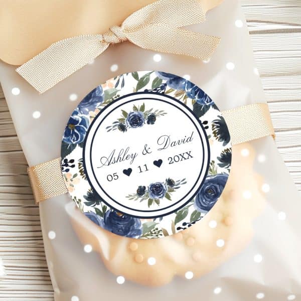 Wedding Favor Bag With A Navy Blue Floral Round Sticker. The Sticker Displays Ashley &Amp; David'S Wedding Date.