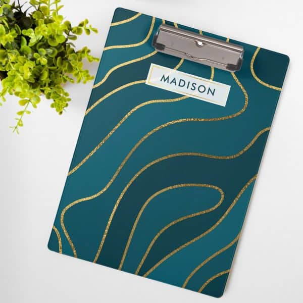 Teal Clipboard With Gold Wavy Lines And The Name Madison.