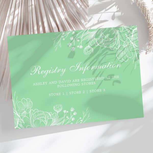 Light Green Registry Information Card With White Floral Accents And Text Listing Ashley And David'S Registry Locations.