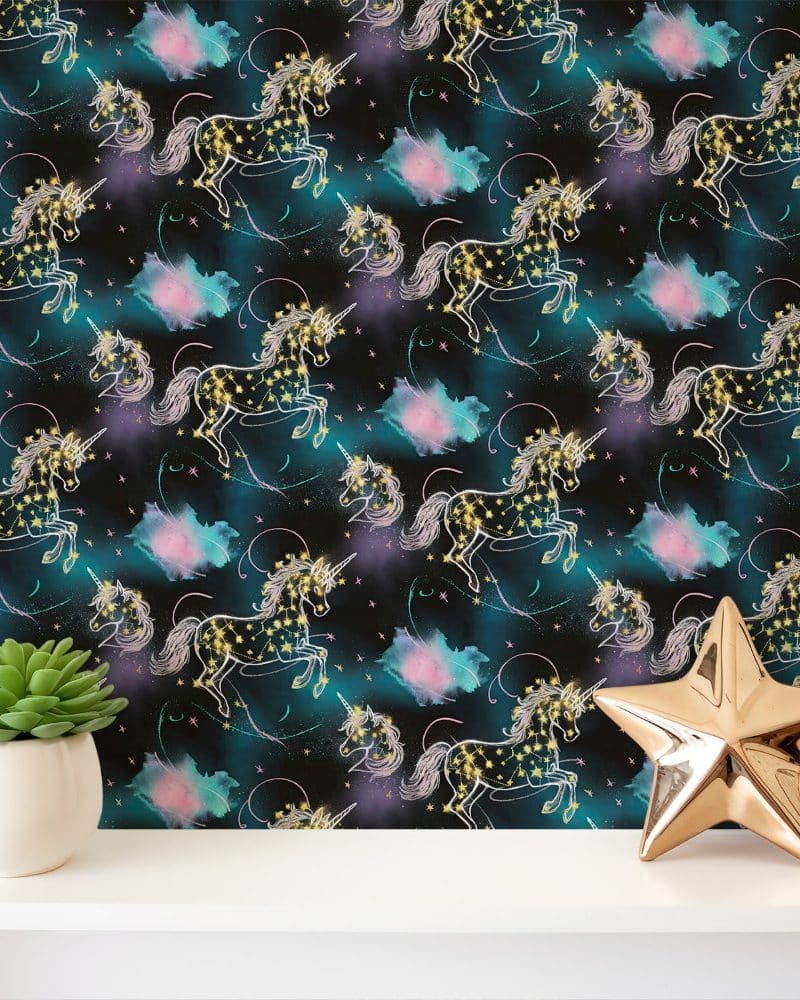 A shelf displays wallpaper featuring a repeating pattern of gold-starred unicorns against a dark background with teal and pink nebulae.