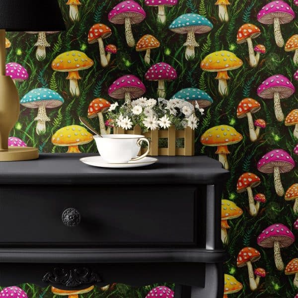 A Teacup And Saucer Sit On A Dark-Colored Nightstand Against A Backdrop Of Vibrant Mushroom Wallpaper.