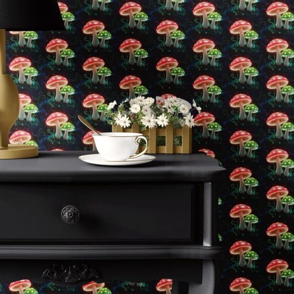 Teacup And Saucer On A Dark Wooden Side Table Against A Wall With A Repeating Pattern Of Glowing Red And Green Mushrooms.