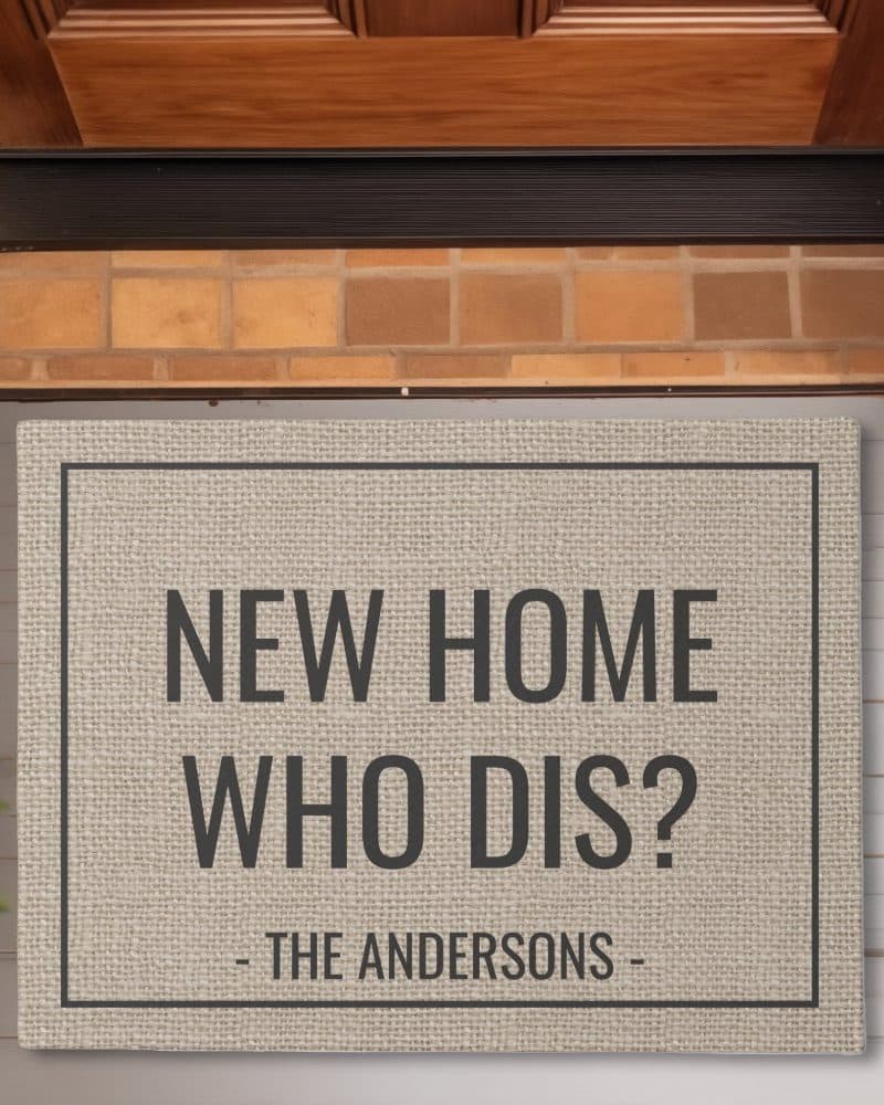 Beige doormat with the text New Home Who Dis? and The Andersons.