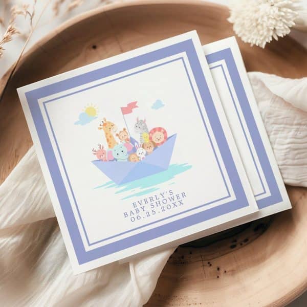 Baby Shower Invitation Featuring A Paper Boat Filled With Cartoon Animals.