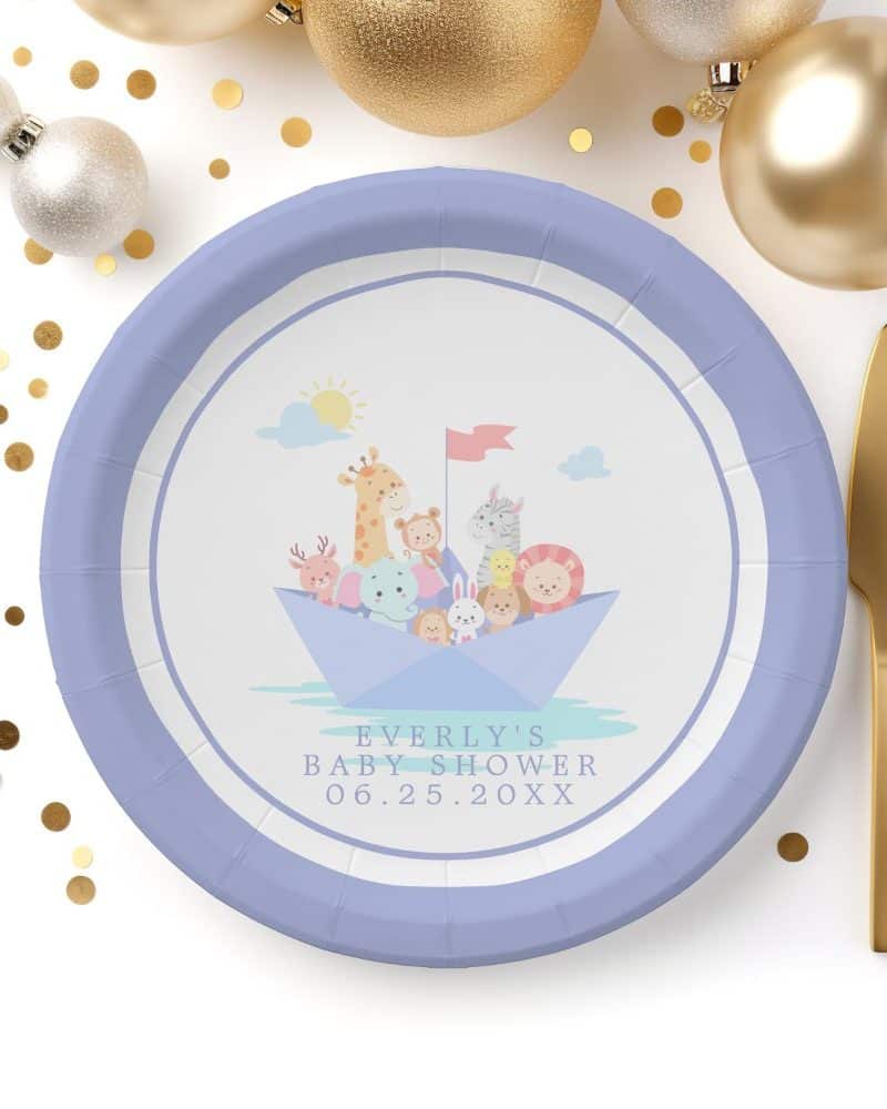 Purple paper plate with illustration of animals on a paper boat; text says Everly's Baby Shower and date.