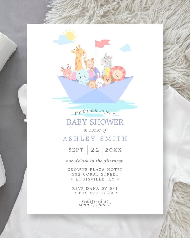 Baby shower invitation featuring animals on a paper boat.