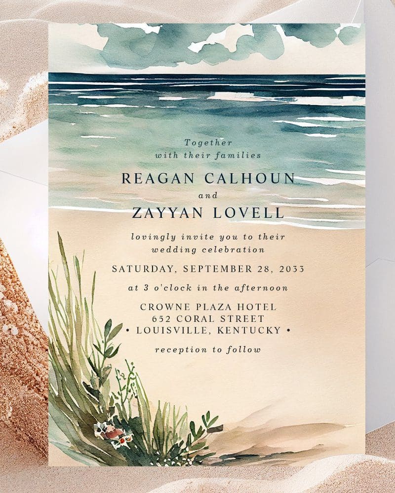 Wedding invitation featuring a watercolor painting of an ocean beach scene. The names Reagan Calhoun and Zayyan Lovell are prominently displayed.