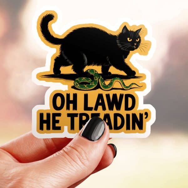 Sticker Of A Black Cat Standing Over A Snake With The Text Oh Lawd He Treadin'.