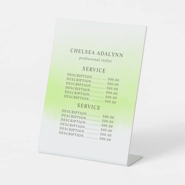 A Freestanding Sign Displaying Chelsea Adalynn, Professional Stylist, And A Price List For Services.