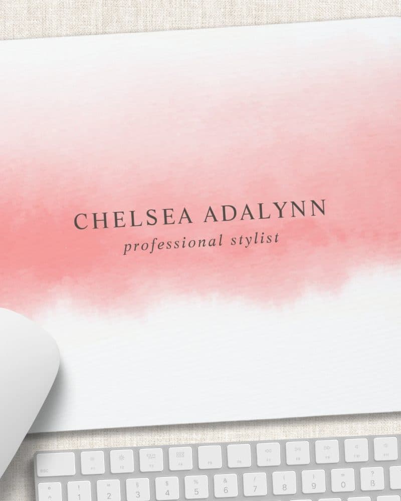 Pink watercolor mousepad with Chelsea Adalynn professional stylist text.