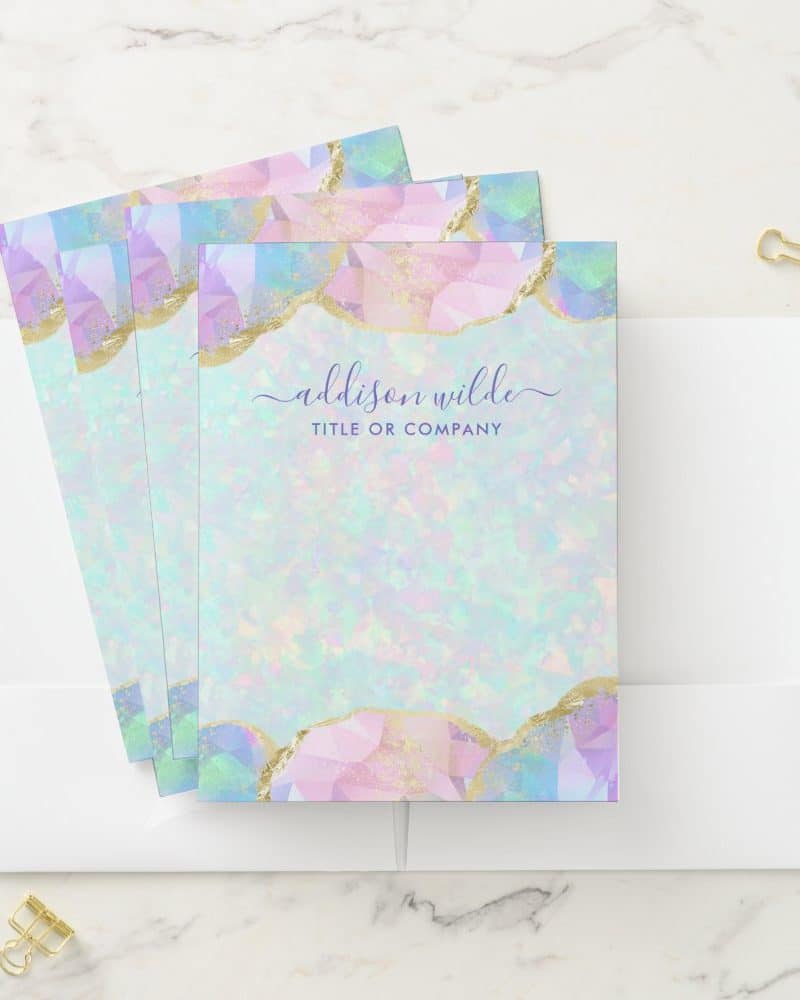 Pastel rainbow colored gemstone design stationery with gold accents and a name and title.