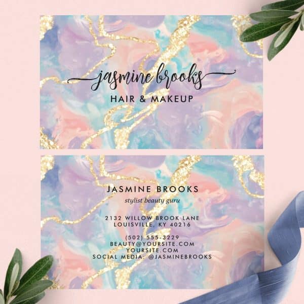 Two Business Cards For Jasmine Brooks, Hair And Makeup Stylist, Featuring A Pastel Marble Design With Gold Accents.