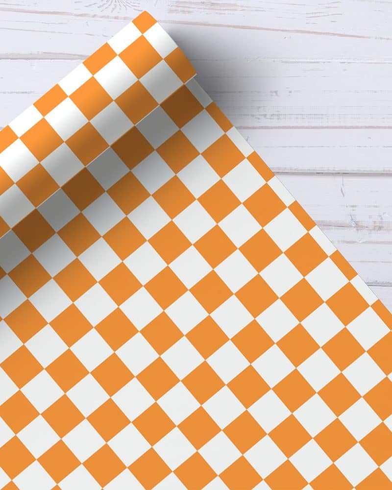 Orange and white checkered wrapping paper roll.