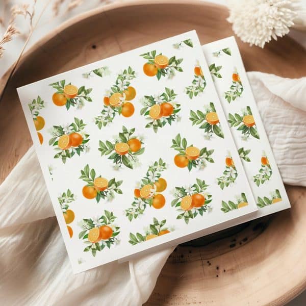 Two Square Pieces Of Stationery With A Repeating Pattern Of Oranges And Blossoms.
