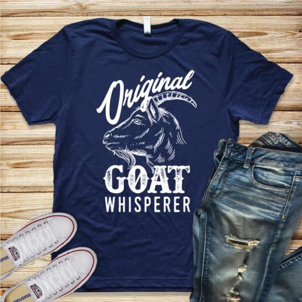 Dark Blue T-Shirt Featuring A Drawing Of A Goat'S Head And The Text Original Goat Whisperer.