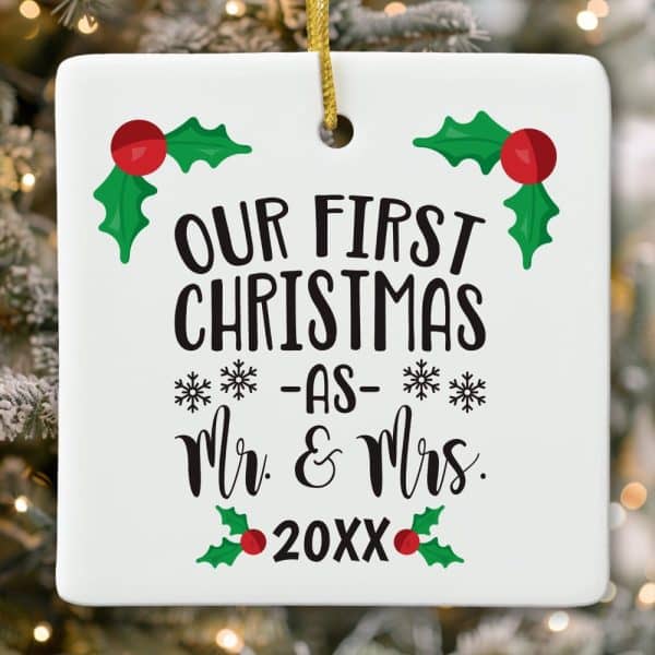 White Square Christmas Ornament That Reads Our First Christmas As Mr. &Amp; Mrs. 20Xx. Holly Leaves And Berries Decorate The Design.