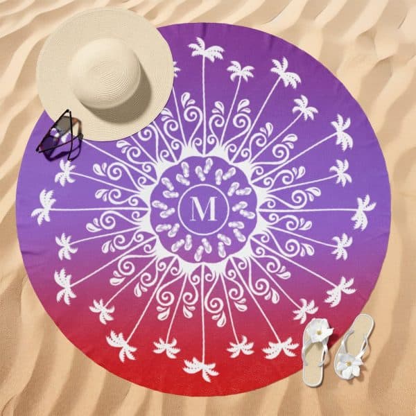 Purple And Red Ombre Round Beach Towel With A Central Mandala Design Featuring Palm Trees And Flip-Flops, And A Monogrammed Initial M.