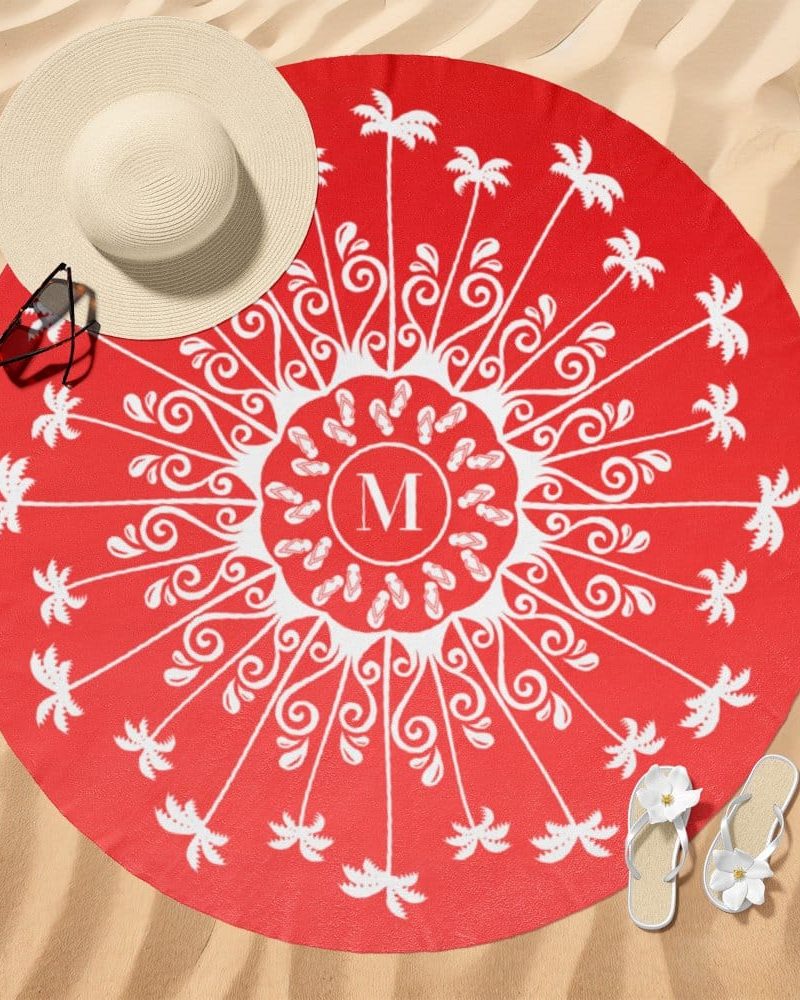 Red round beach towel with a white mandala design featuring palm trees and flip-flops, and a central monogram.