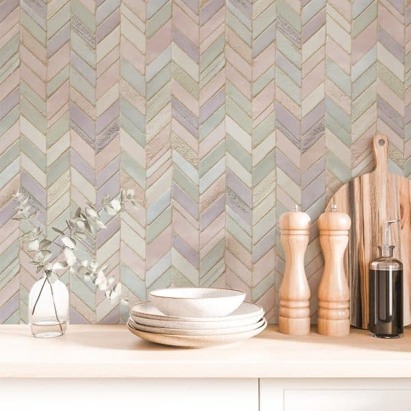 Pastel Chevron Patterned Backsplash With Kitchenware In Front.