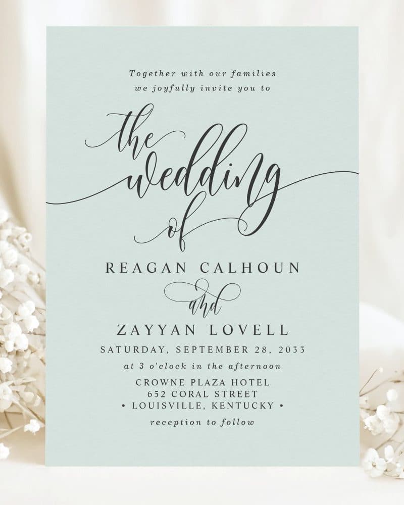 Wedding invitation for Reagan Calhoun and Zayyan Lovell, September 28, 2033, at the Crowne Plaza Hotel in Louisville, Kentucky.