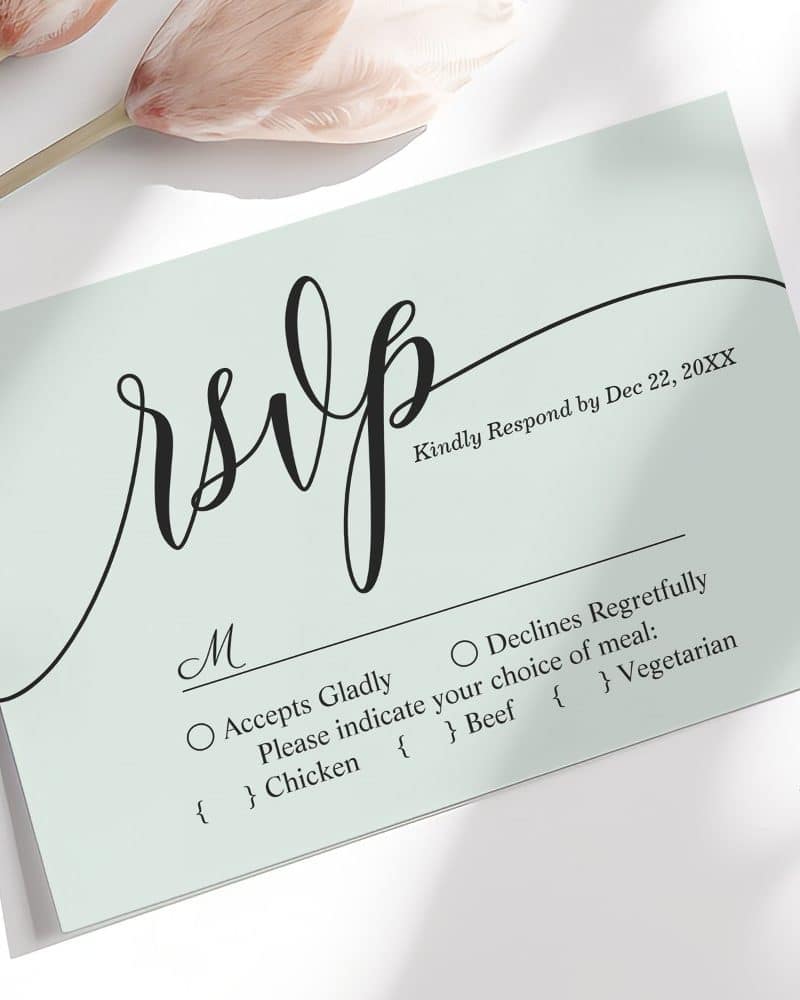 Light green RSVP card with elegant script lettering.