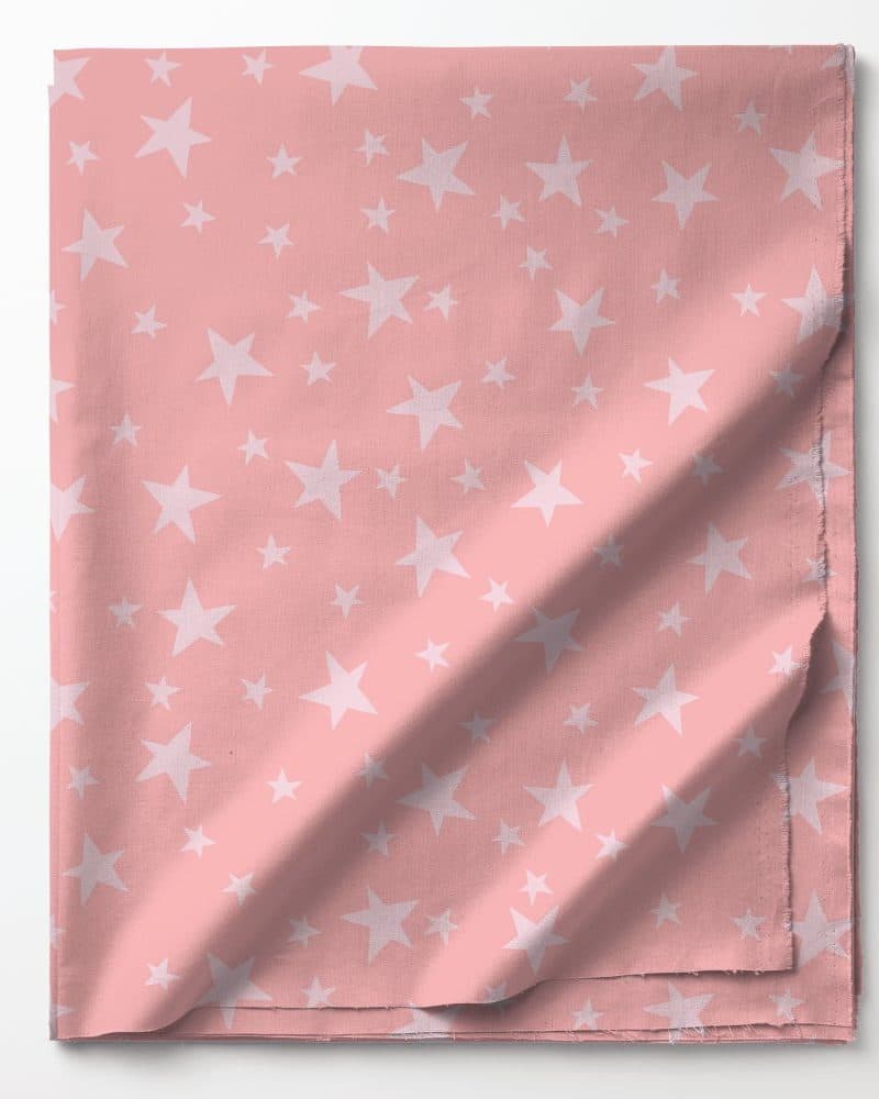 Pink fabric with a pattern of lighter pink stars.