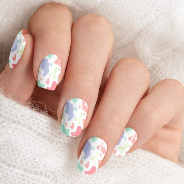 Closeup Of A Hand With Pastel Abstract Nail Art.