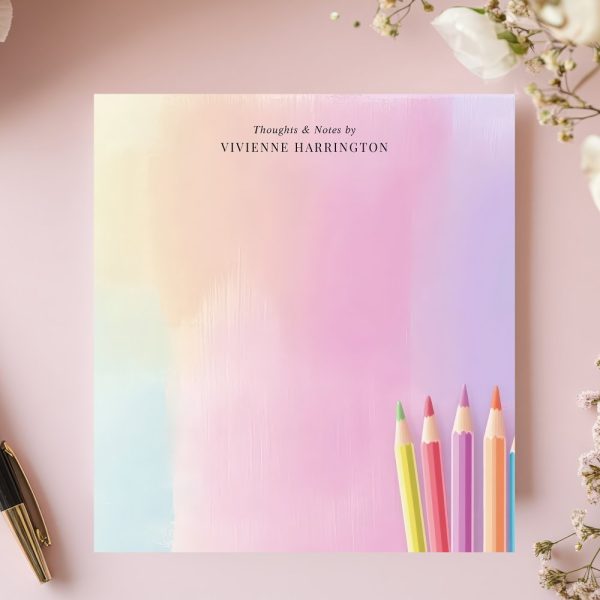 Pastel Colored Notepad With Colored Pencils In The Bottom Right Corner. The Notepad Is Labeled With The Name Vivienne Harrington.