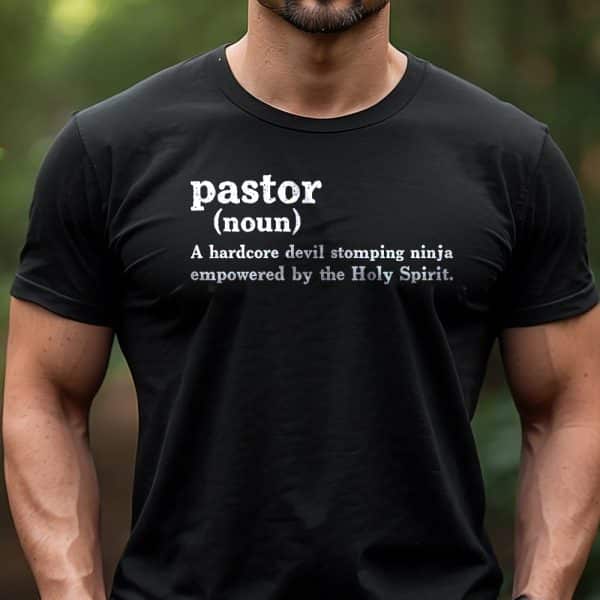 Man Wearing A Black T-Shirt With A Humorous Definition Of Pastor.