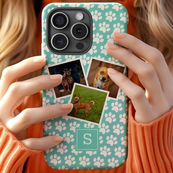A Teal Phone Case With White Paw Prints And Personalized Photos Of Small Dogs Is Held By A Person.