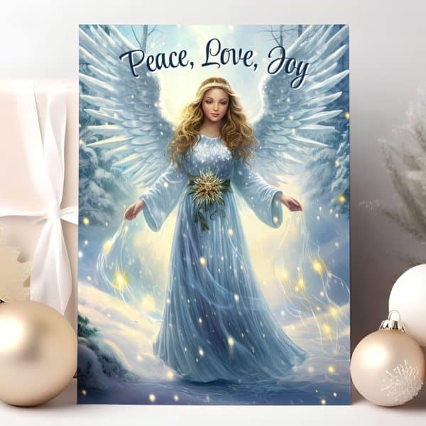 A Light Blue Angel With Large Wings Stands In A Snowy Winter Scene, Surrounded By Sparkling Lights. The Words Peace, Love, Joy Are At The Top.