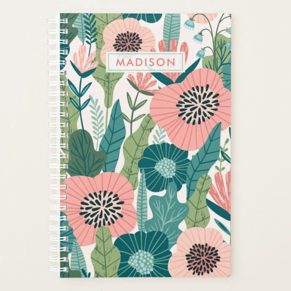 Spiral-Bound Notebook With A Floral Design Featuring Pink And Teal Flowers And Leaves; The Name Madison Is Printed On The Cover.