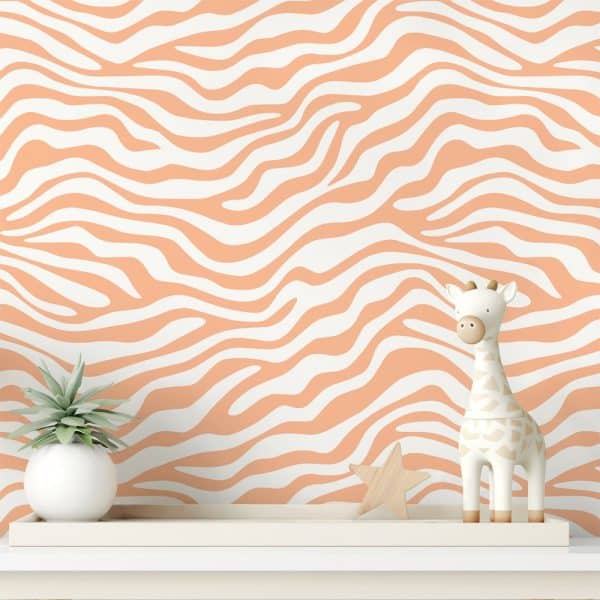 A Peach-Colored Zebra-Striped Wall With A Small Giraffe Figurine And A Succulent Plant On A White Shelf.