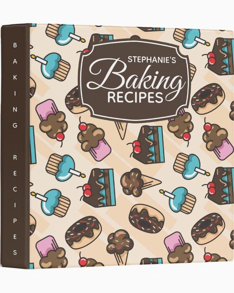 Stephannie's Baking Recipes binder with a pattern of cupcakes, ice cream cones, and donuts.