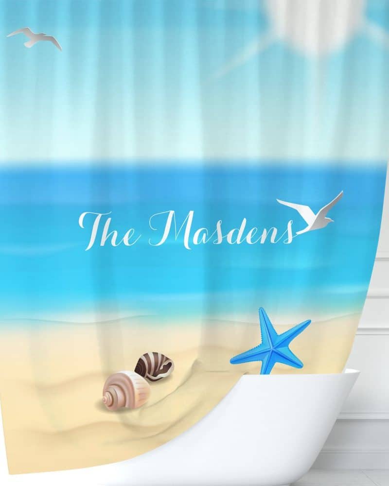 Beach-themed shower curtain with the name The Madsens, seashells, and a starfish.