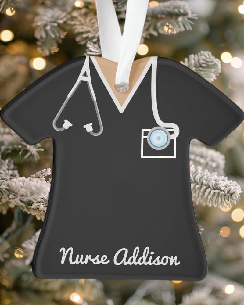 Black nurse scrubs ornament with stethoscope and name Addison.