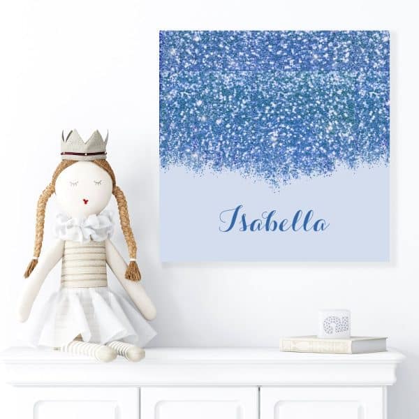 Blue Glitter Canvas With The Name Isabella.
