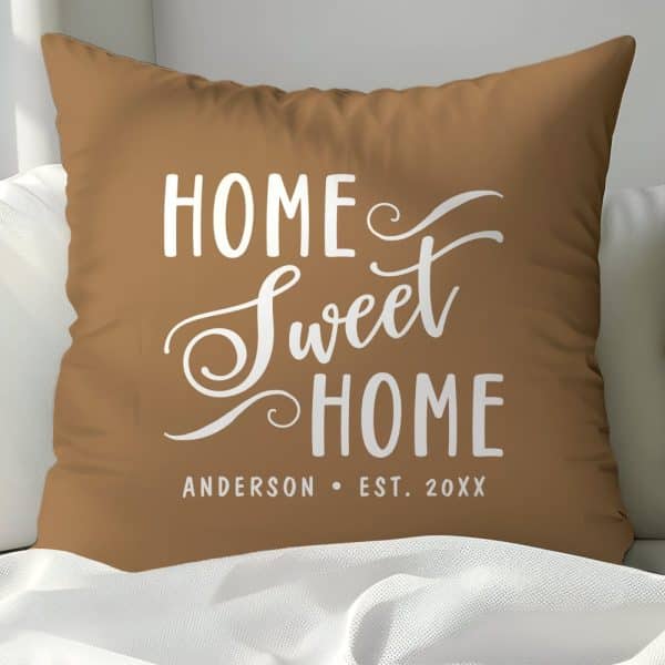 Brown Pillow With White Text Reading Home Sweet Home And Anderson Est. 20Xx.