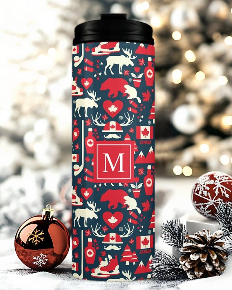 Personalized travel tumbler with a Canadian themed design, including a large initial M.