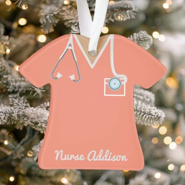 Peach-Colored Nurse Scrubs Ornament With Stethoscope And Name, Nurse Addison.