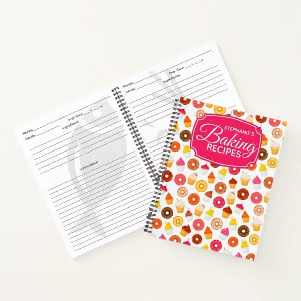Spiral-Bound Baking Recipe Book With A Colorful Cupcake And Donut Cover.