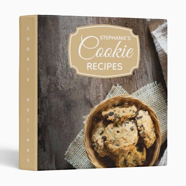 A Cookbook Titled Stephanies Cookie Recipes Featuring A Basket Of Chocolate Chip Cookies.