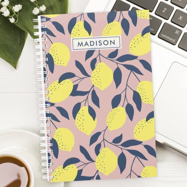 Pink Spiral Notebook With A Lemon Pattern And The Name Madison On The Cover.