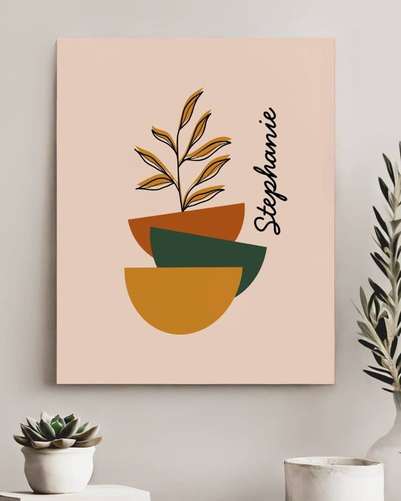 Abstract art print featuring a stylized plant in muted orange and green tones, with the name Stephanie.
