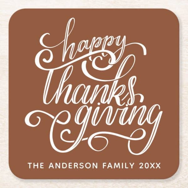 Brown Thanksgiving Card With White Script That Says Happy Thanksgiving, And The Anderson Family Name And Year At The Bottom.