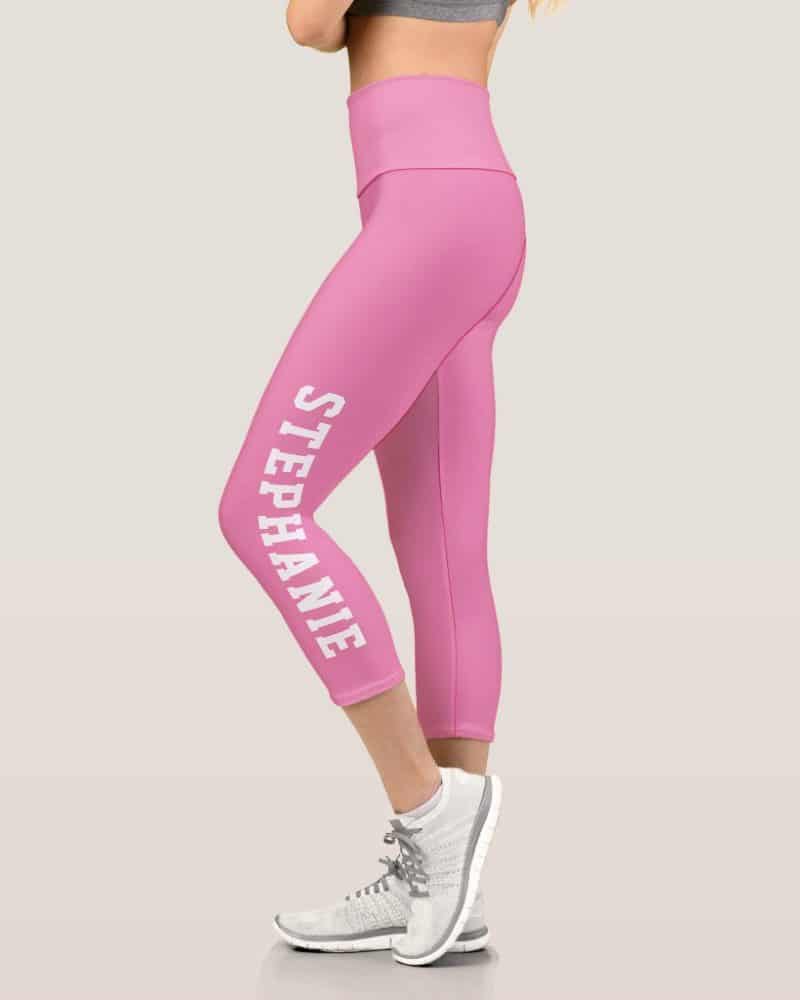 Pink capri leggings with the name Stephanie printed vertically on the leg.