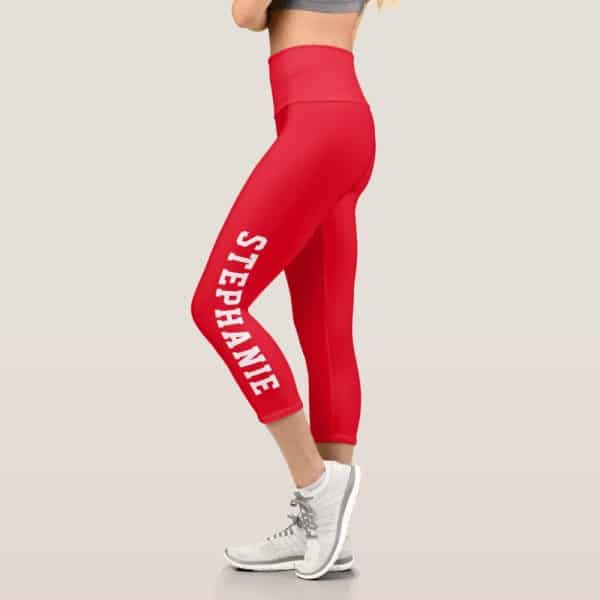 Red Capri Leggings With The Name Stephanie Printed Vertically Down The Side.