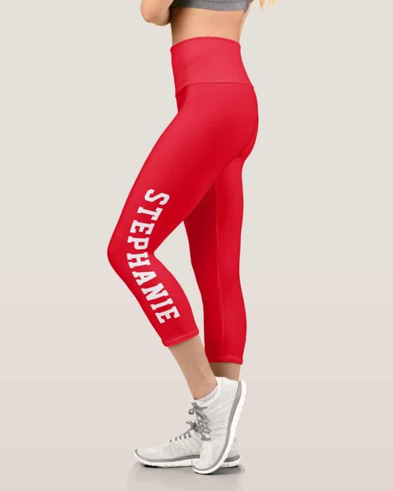 Red capri leggings with the name Stephanie printed vertically down the side.